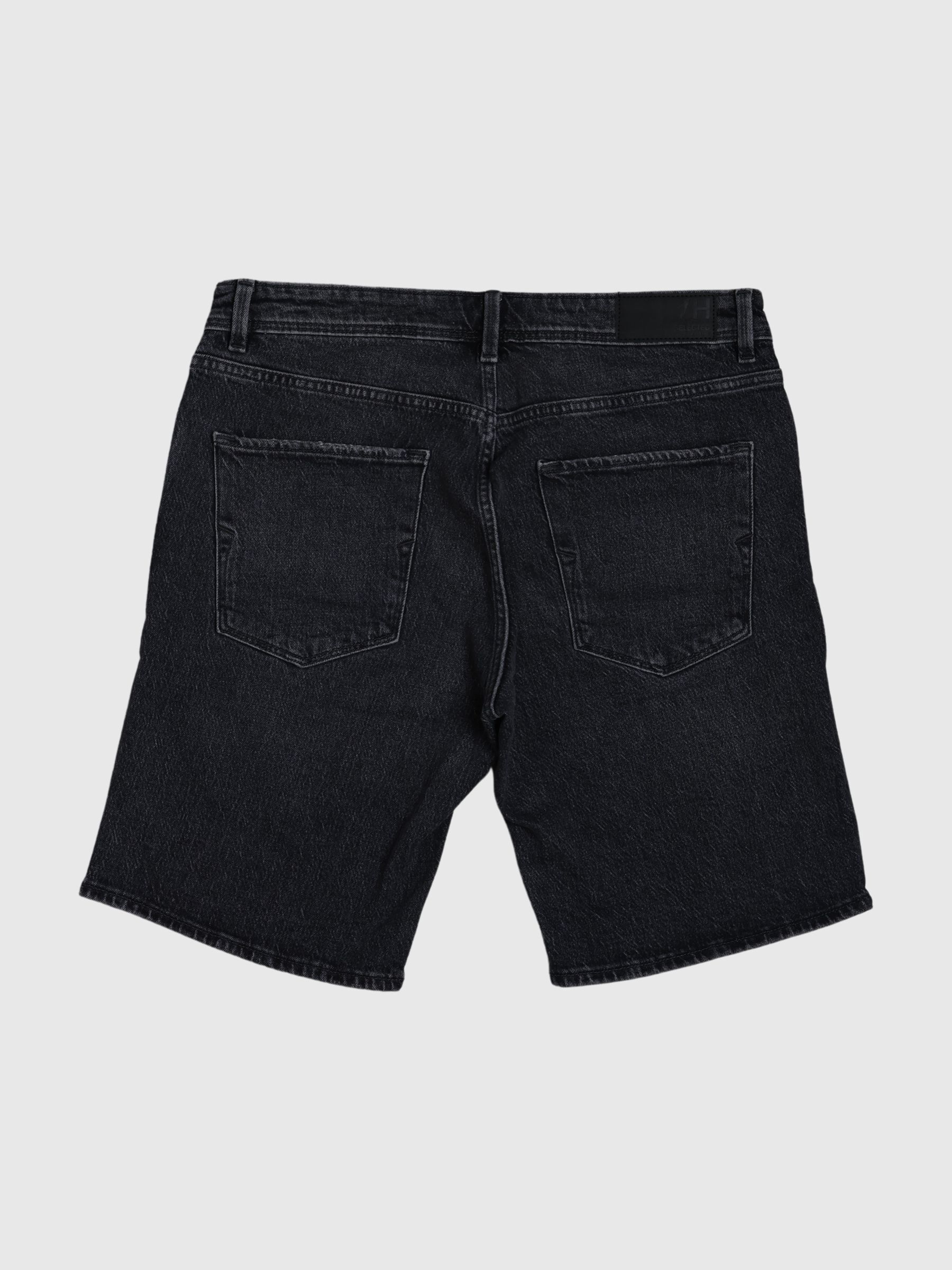 Distressed black shorts on sale