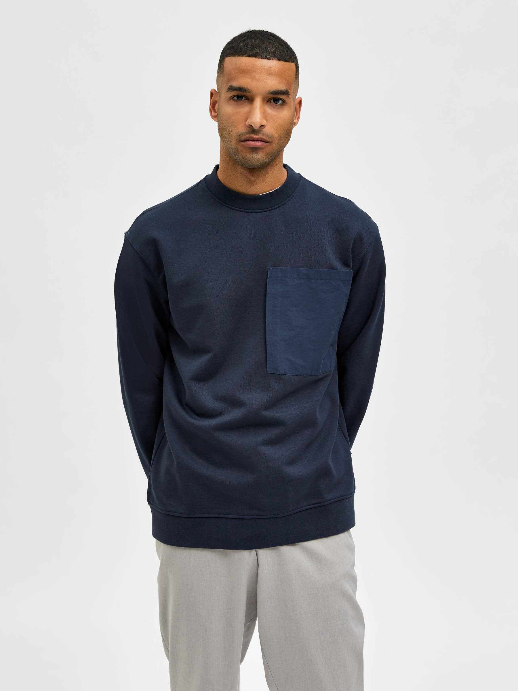 blue crew neck sweatshirt