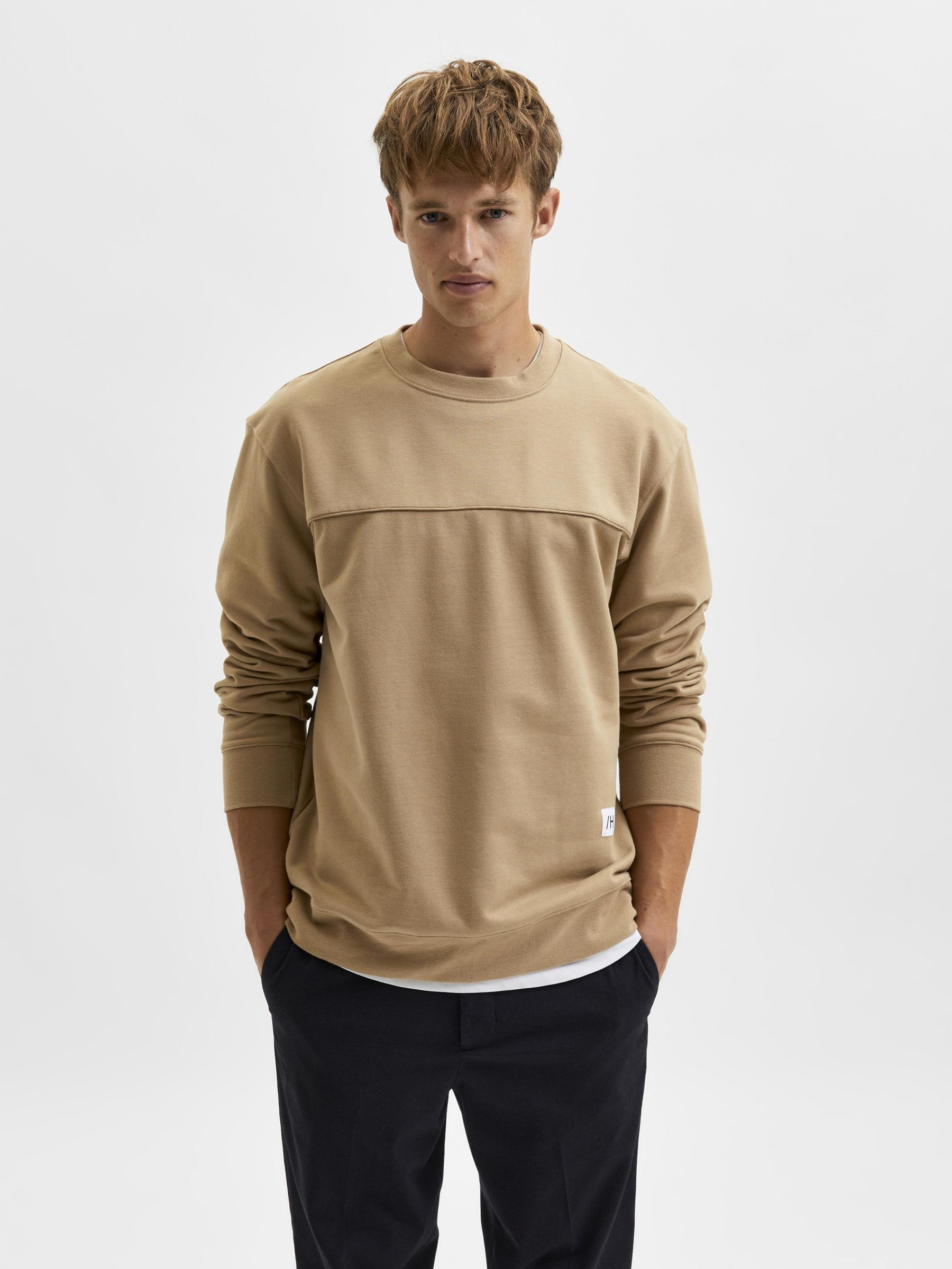 tan crew neck sweatshirt