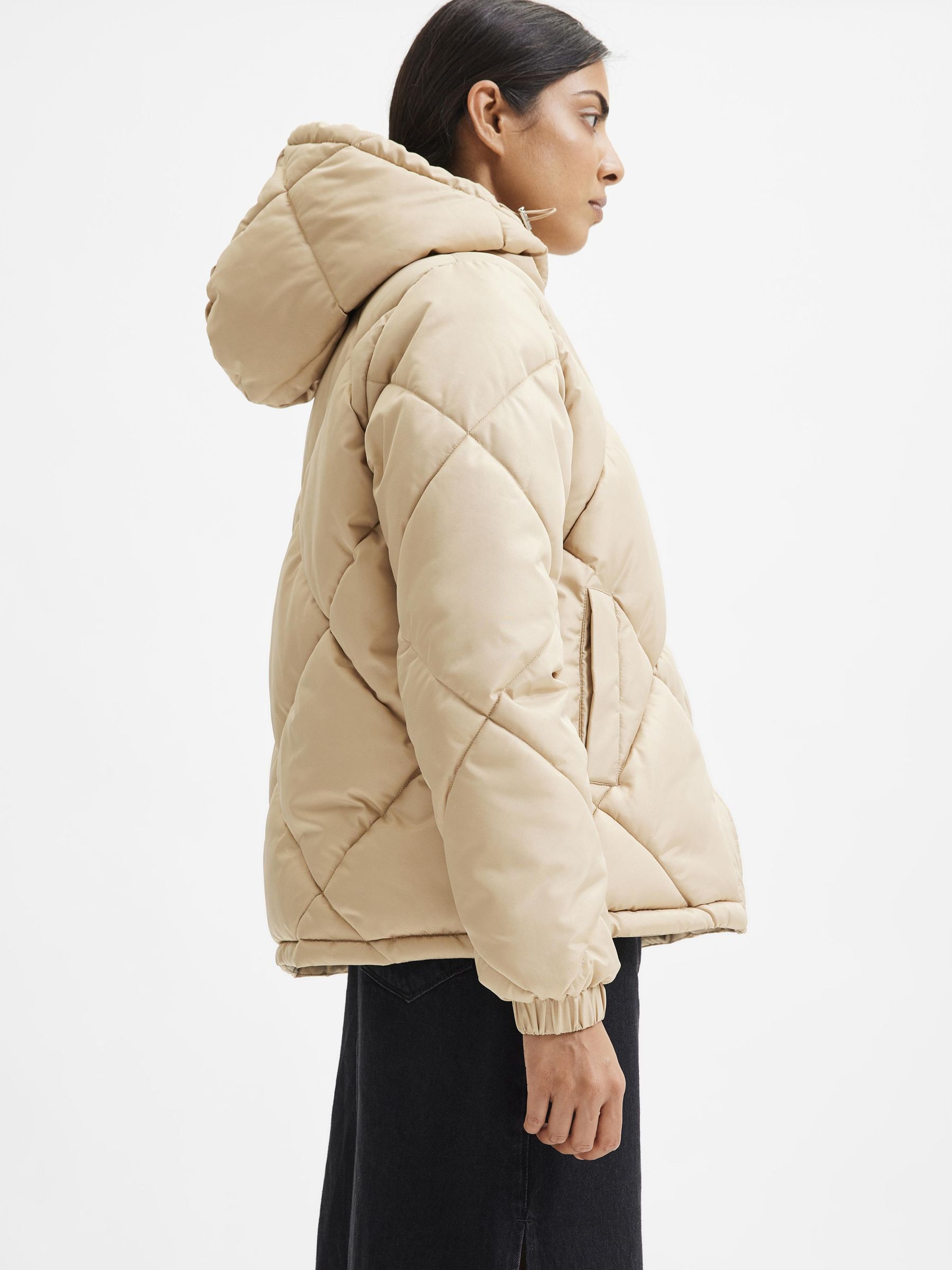 cream colored puffer jacket