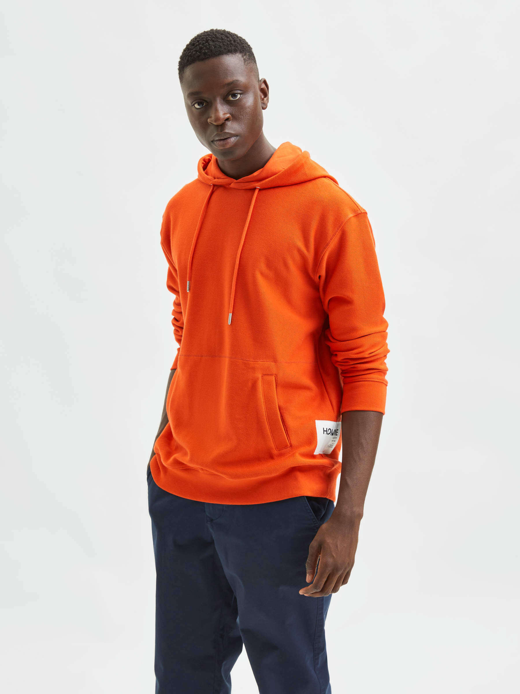 orange sweatpants and sweatshirts