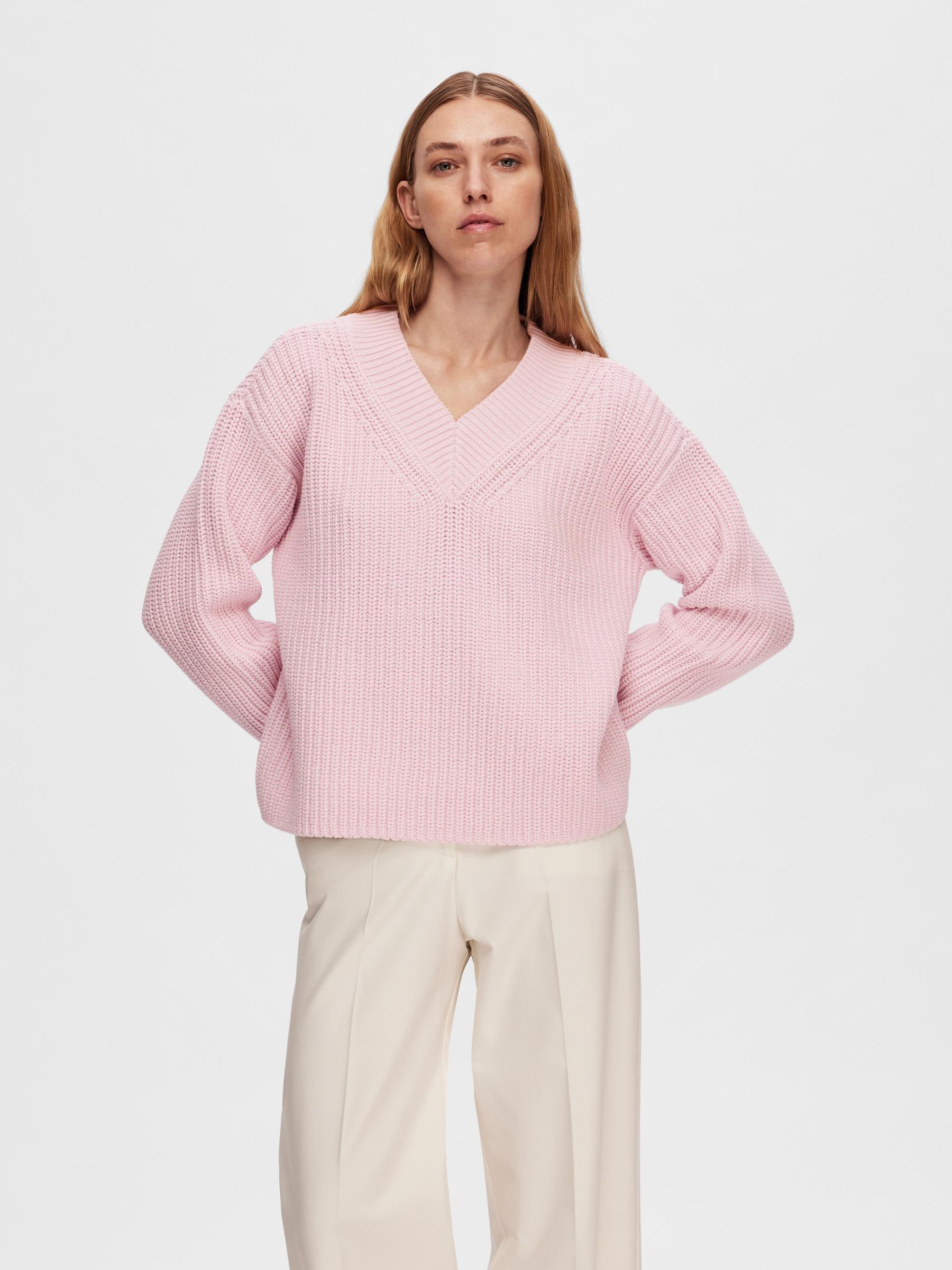Roze v shop hals trui